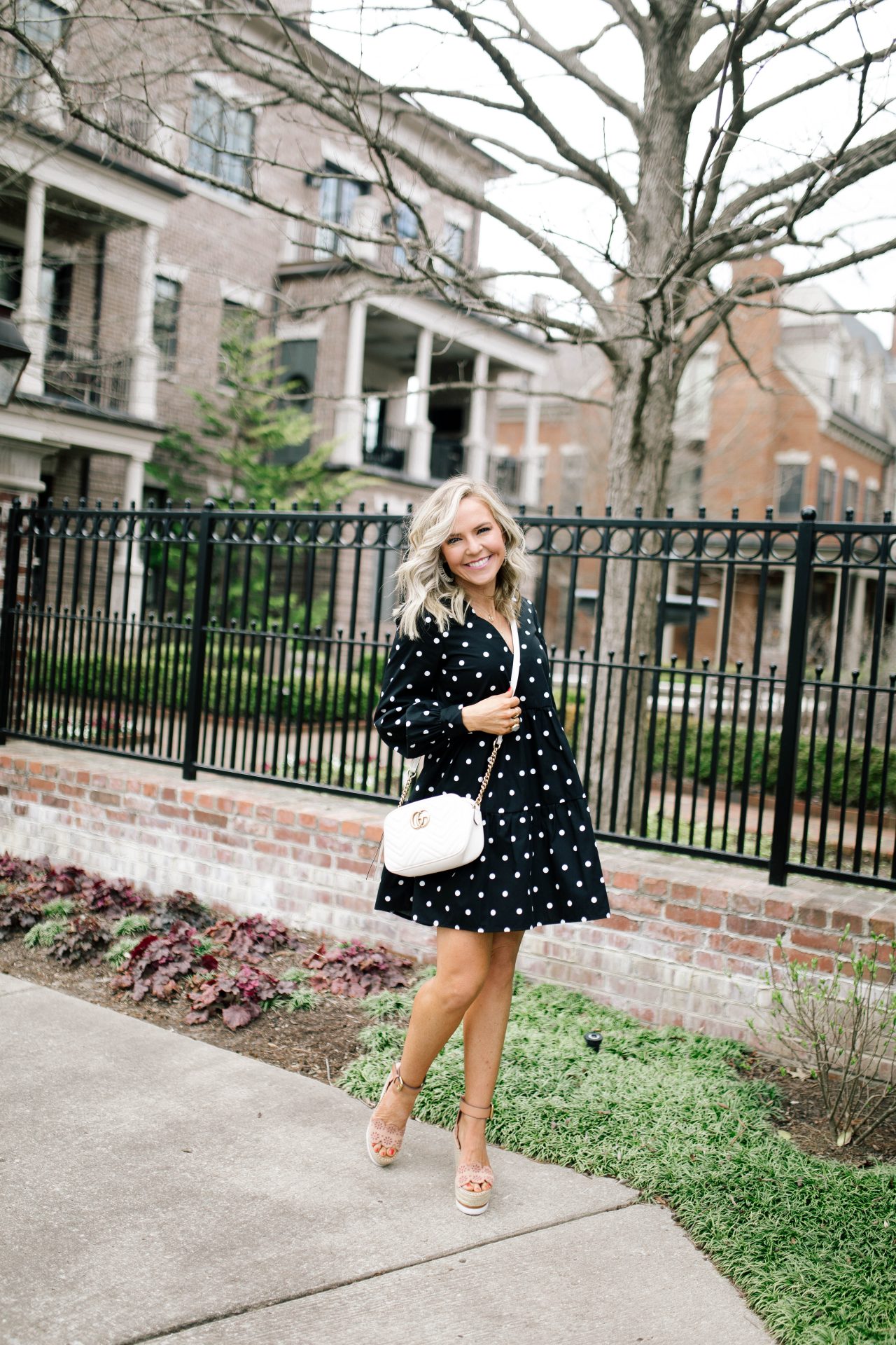 Life is Short... Buy the Bag! Designer Handbags with eBay Authenticate featured by top US fashion blog, Hello! Happiness; Image of woman wearing a black polka dot dress, Gucci Marmont purse and Chloe Eyelet wedges